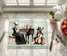 Load image into Gallery viewer, Elegant skeleton woman playing piano and skeleton cellist in tuxedo, 11x15 inch tempered glass cutting board Halloween Decorations