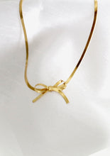 Load image into Gallery viewer, Gold Tone Herringbone Bow Necklace
