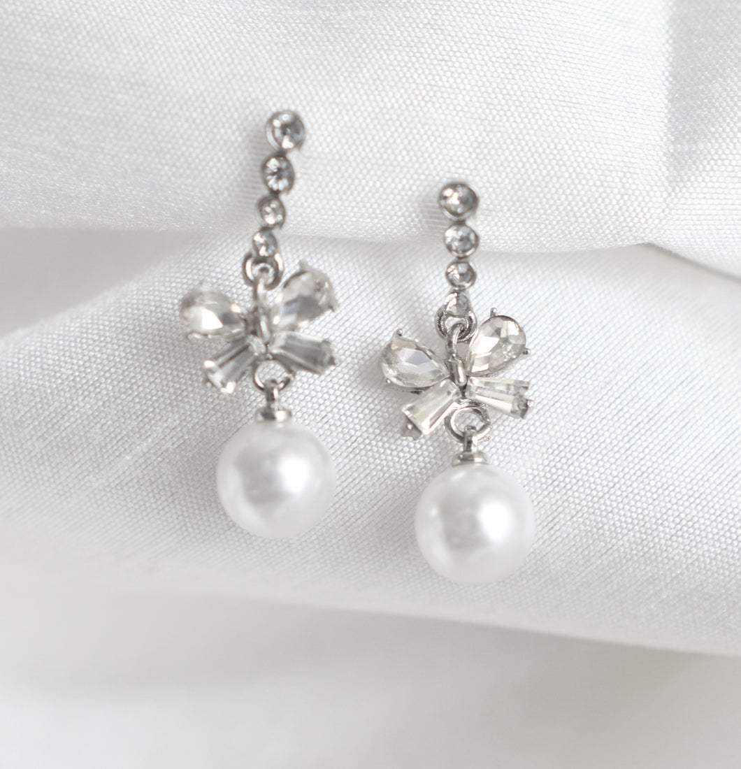 Affordable silver pearl drop earrings with rhinestone flower detail, feminine jewelry for women
