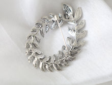 Load image into Gallery viewer, Silver leaf wreath brooch with sparkling stones, 2 1/8 x 1 1/2 inch vintage inspired jewelry pin for women.
